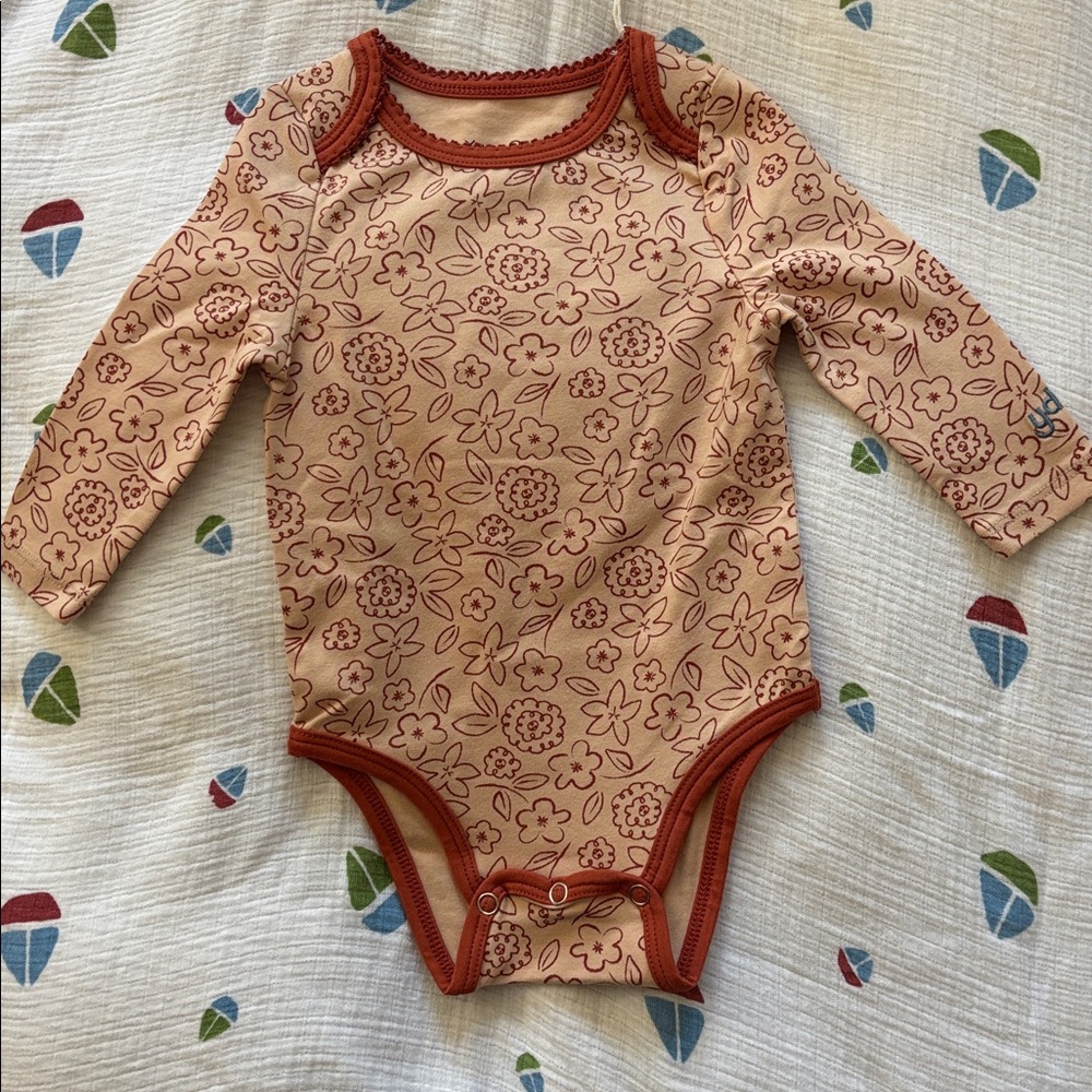 10. Floral Long Sleeve Baby Onesie